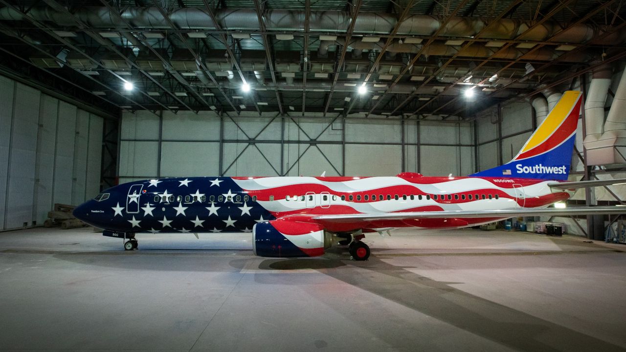 Pictured is Southwest’s Freedom One airplane, a Boeing 737-800 painted with a stylized American flag. The aircraft was painted in Spokane, Washington, by Southwest’s Creative Studio Team. (Southwest Airlines)